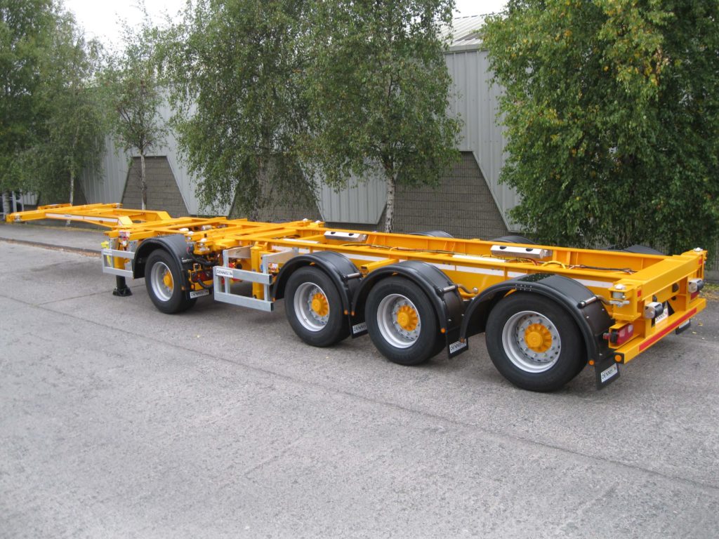 UNVEILING THE NEW, PATENTED GOOSENECK RISING SLIDING BOGIE TRAILER Dennison Trailers
