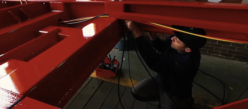 Dennison Employee Working on a Trailer